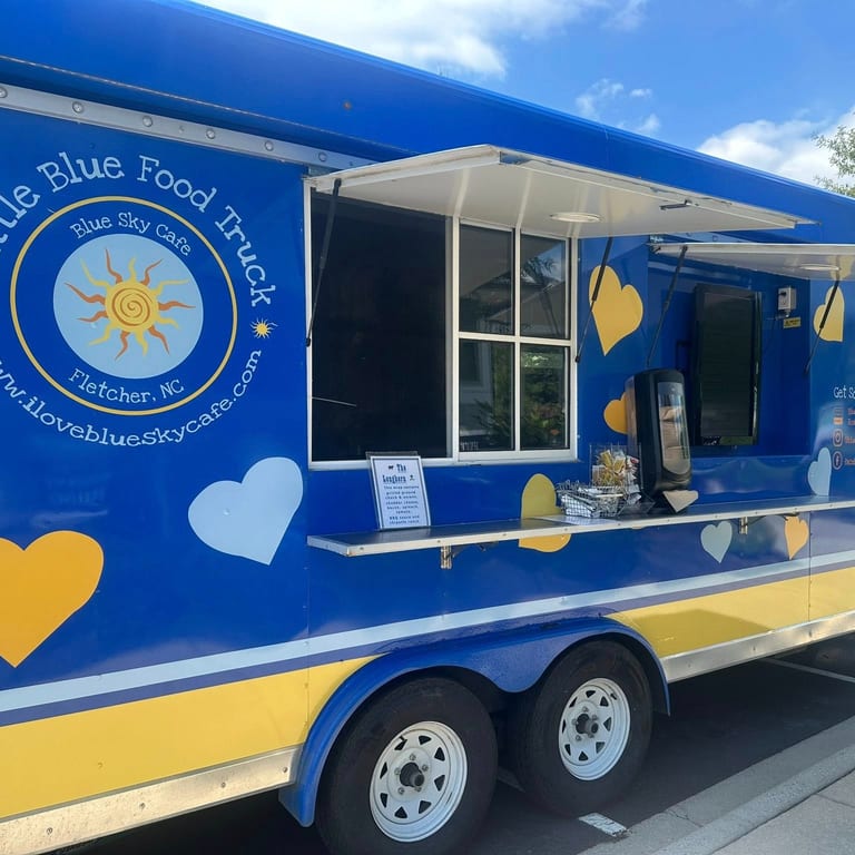 Little Blue Food Truck On The Move